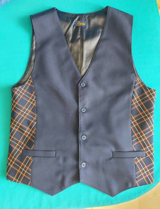 Школьная жилетка
