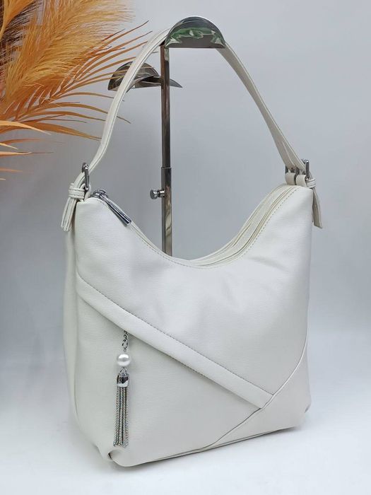 Женские сумочки по доступной цене