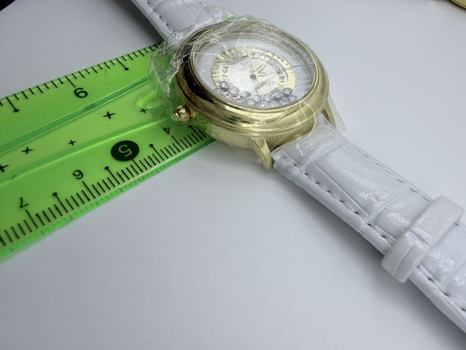 Женские золотые часы Chopard