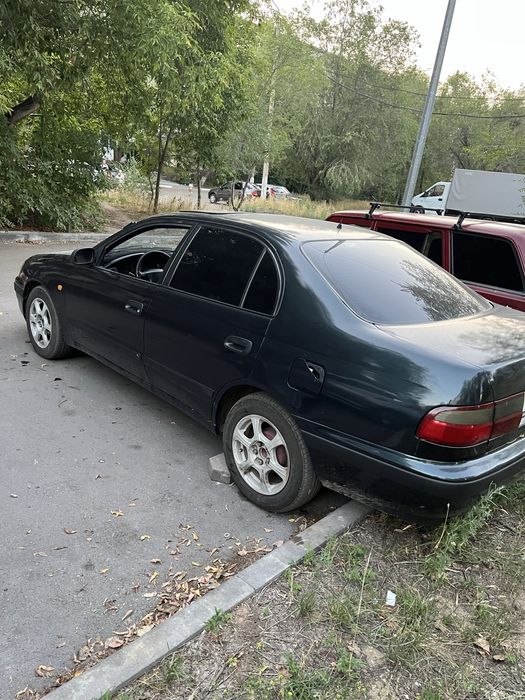 Проади тойоту карину е
