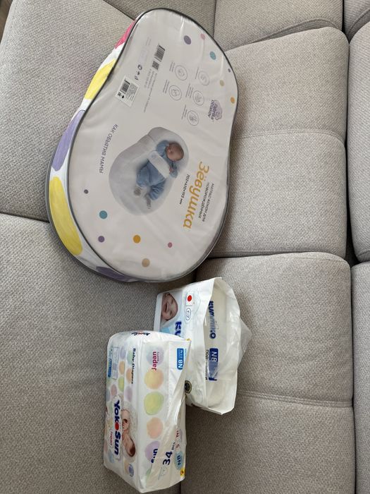 Продам кокон Зёвушка, новый, в подарок подгузники