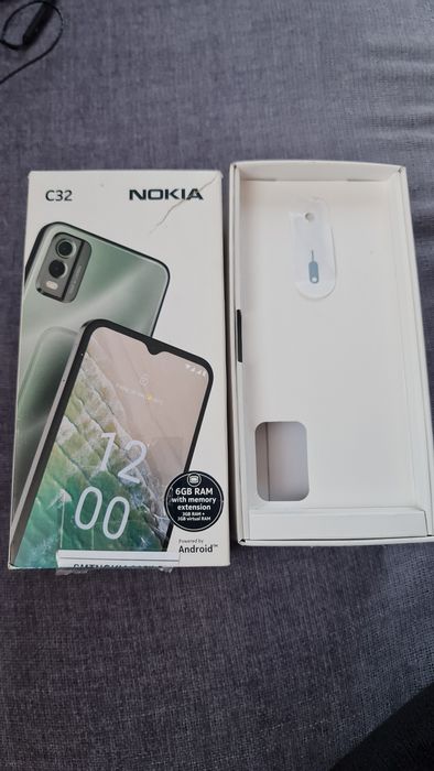 Telefon sigilat Nokia c32