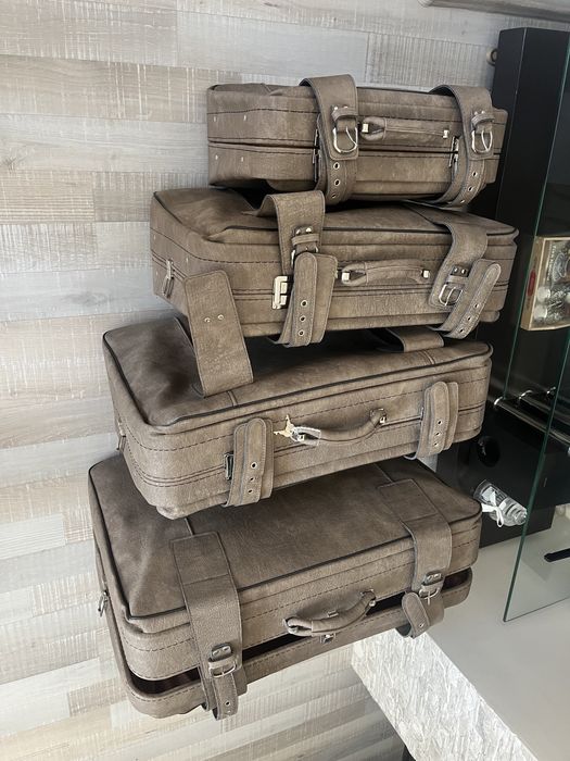 4 броя кожени куфари