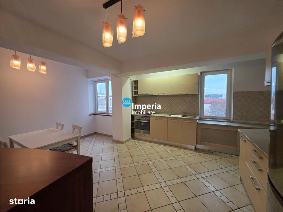 3 camere în inima orașului — fotografia 3