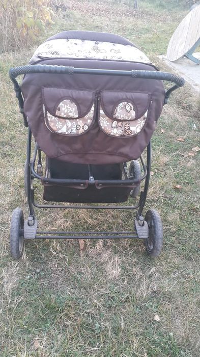 Детская коляска на двоих