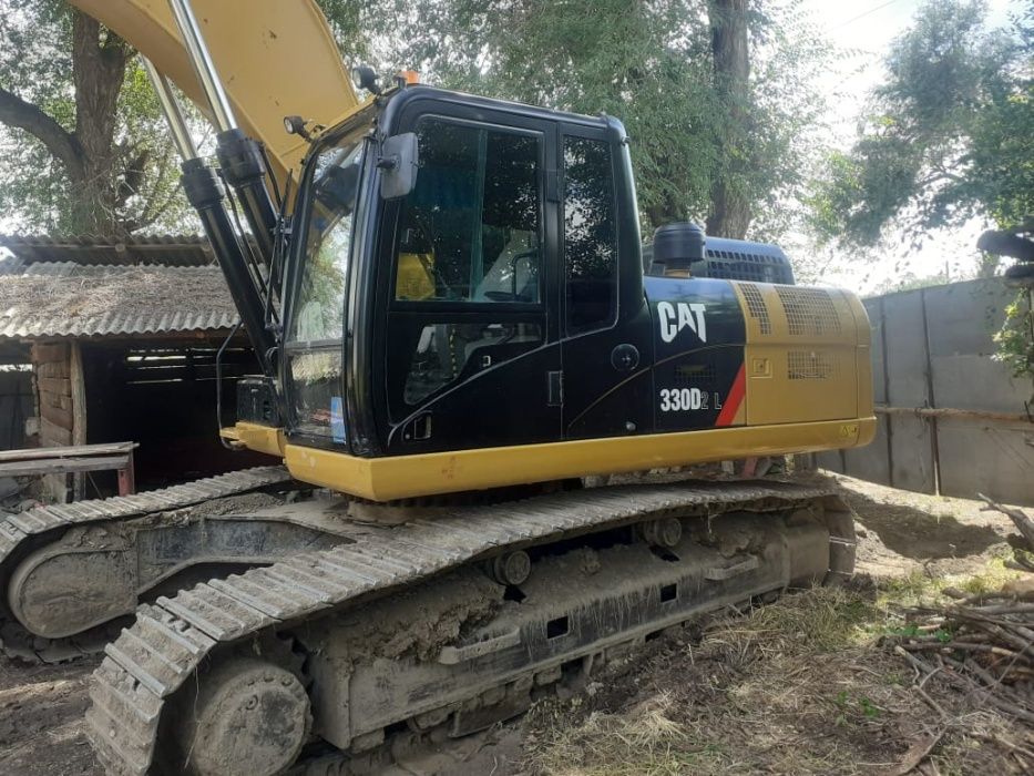 Экскаватор с гидромолотом. Гидромолот CAT B30