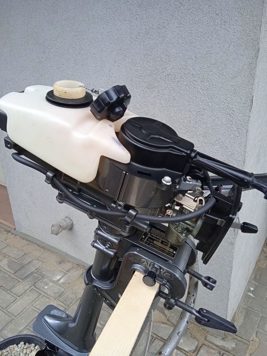 Canoe cu motor Suzuki 2cp