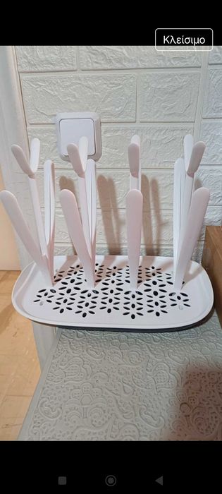 Поставка за шишета