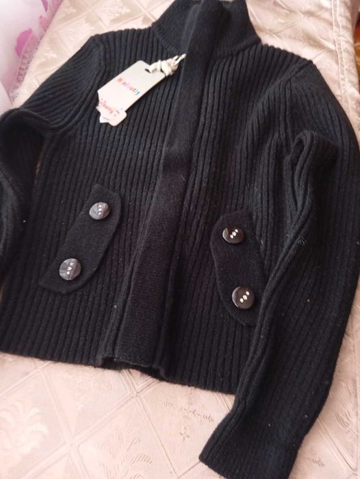 Продам теплую кофточку