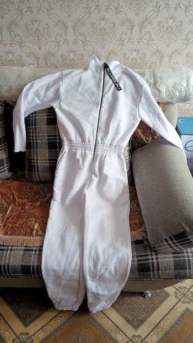Новый комбинизон с этикеткой красивый чётки .Качества супер