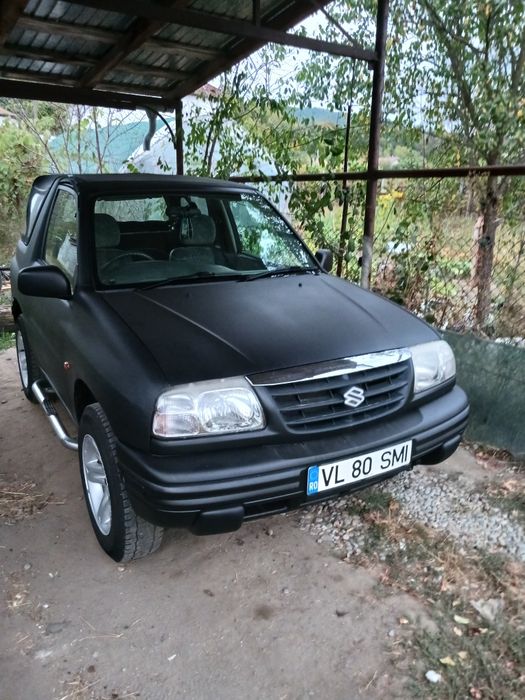 Suzuki Grand Vitara sau schimb cu mașina de teren cu bena