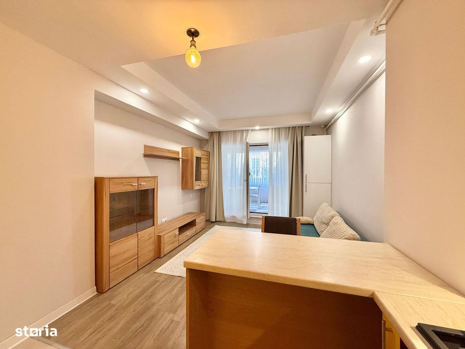 COSMOPOLIS - Apartament cu 2 camere tip studio, mobilat si utilat.