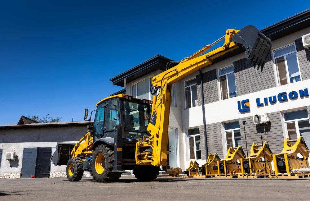 Экскаватор погрузчик базамизада тайор CLG777A!