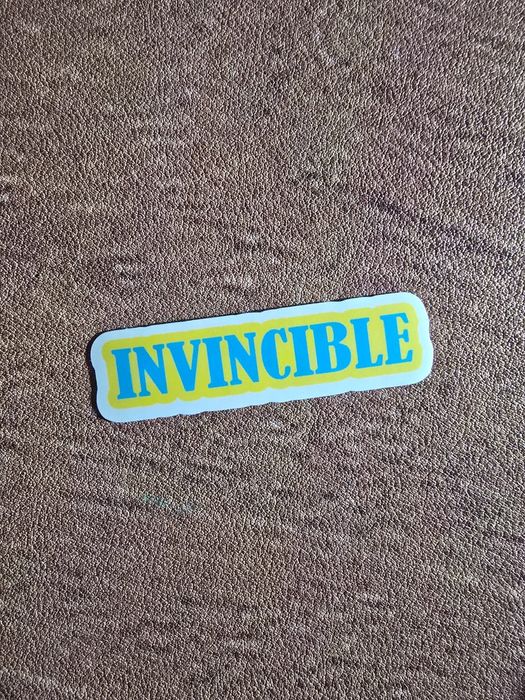 Наклейки и брелки Invincible