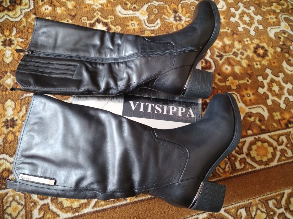 Продам женские сапоги
