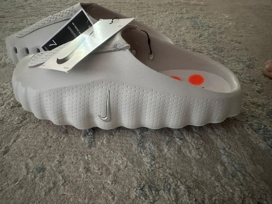 Продам тапочки Nike Mind 001