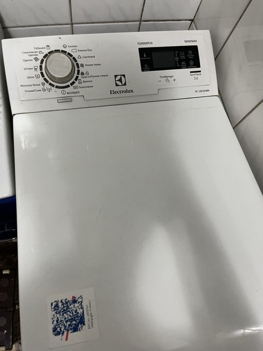 Машинка вертикальная electrolux