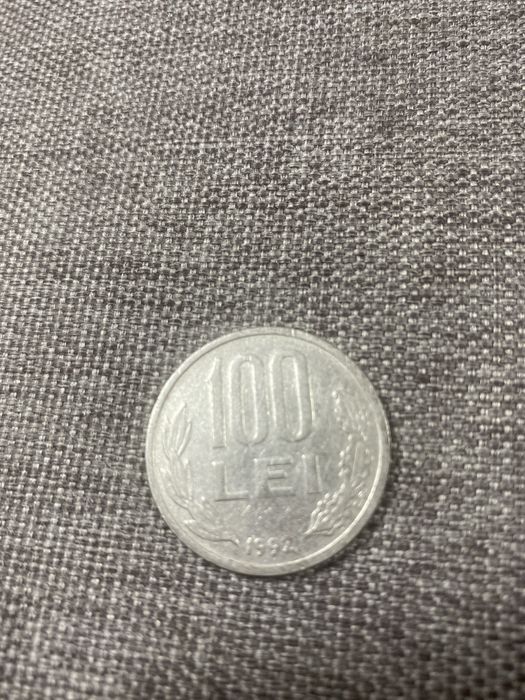 moneda 100 lei schimb