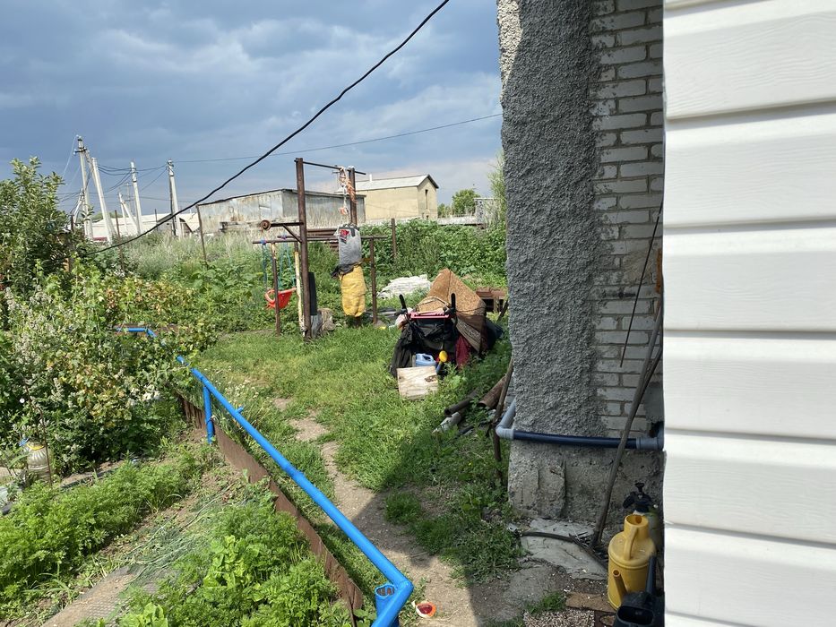 Четырехкомнатный дом в черте города