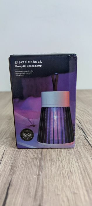 Vând lampă anti țânțari cu agățătoare