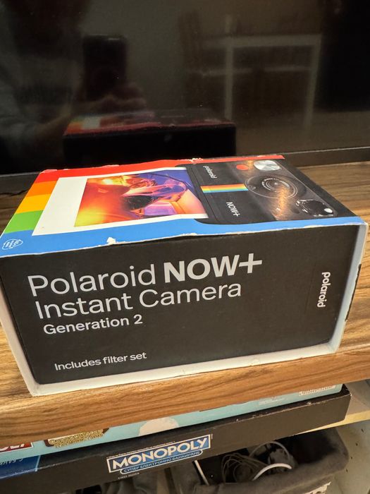 Фотоапарат   за моментни снимки на Полароид