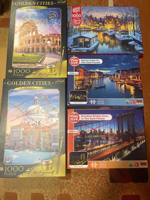 Vand cutii puzzle complete de  1000 buc.