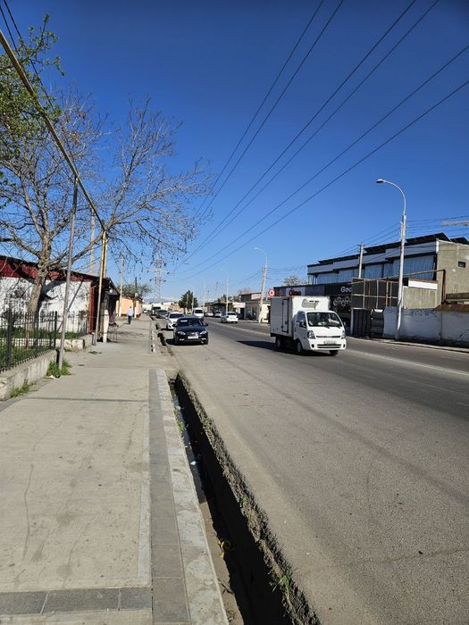 Вдоль дороги продаётся 4,5 сотки земля,участок Фаргона йули