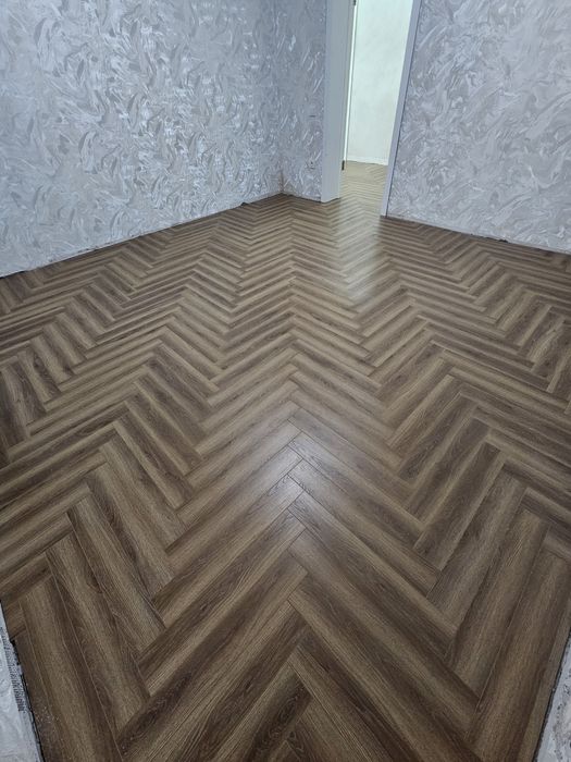 Укладка ламината,постил линолеума