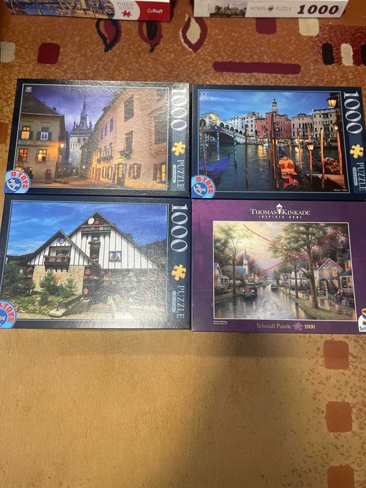 Vand cutii puzzle complete de  1000 buc.