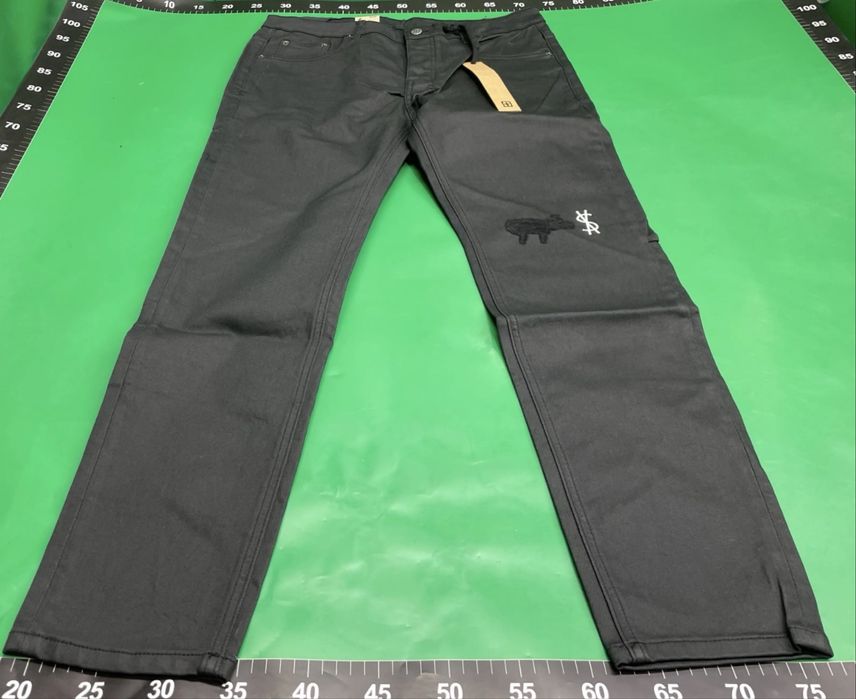 Blugi ksubi cu aspect de piele