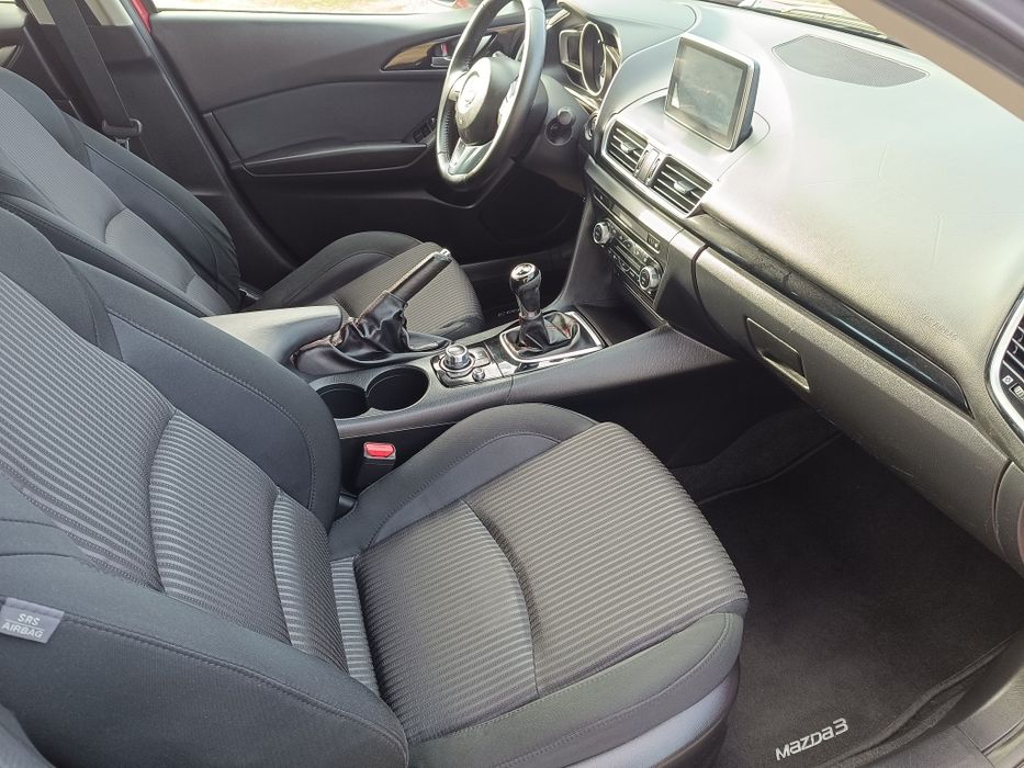 Mazda 3 1.5 benzina 101 cp model 2015