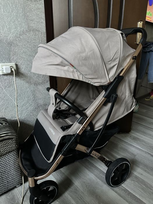 Продам детскую коляску Luxmom