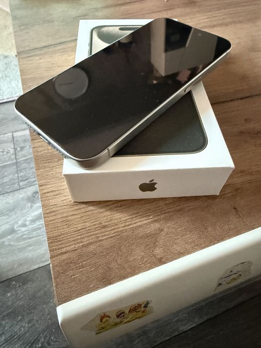 iPhone 15 pro natural titanium 128gb