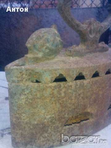 Стара ютия на жар