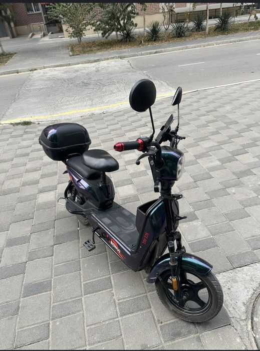 Скутер електрони  удар