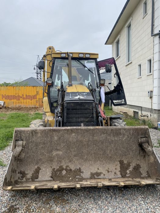 Услуги экскавтор погрузчика