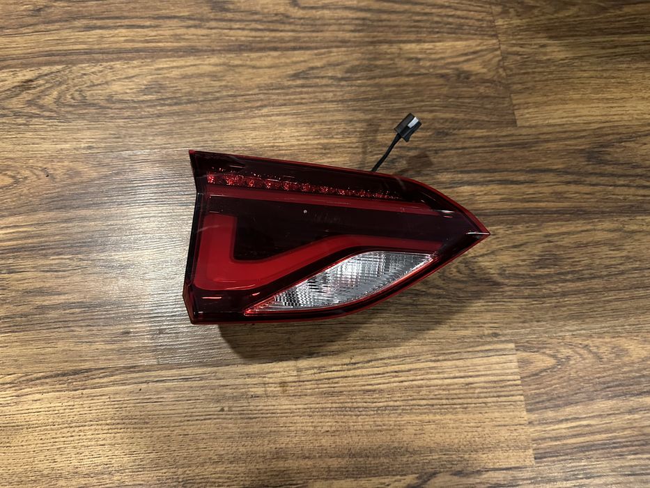 Фонарь задний Monza левый в крышку багажника