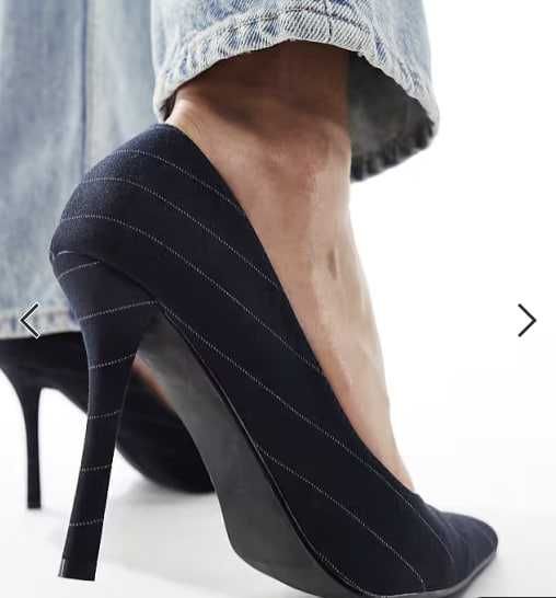 Черные туфли на шпильке