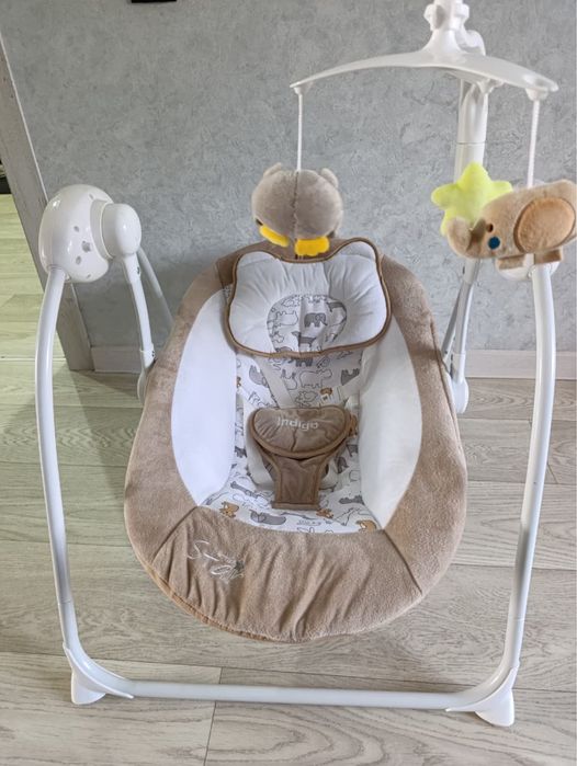 Электрическая детская качеля