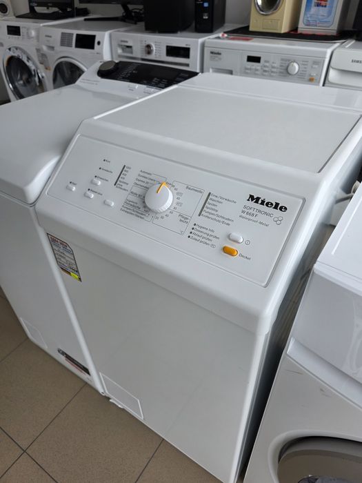 Пералня с горно зареждане Míele