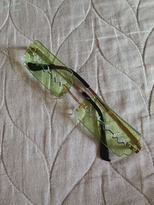 Солнце защитные очки