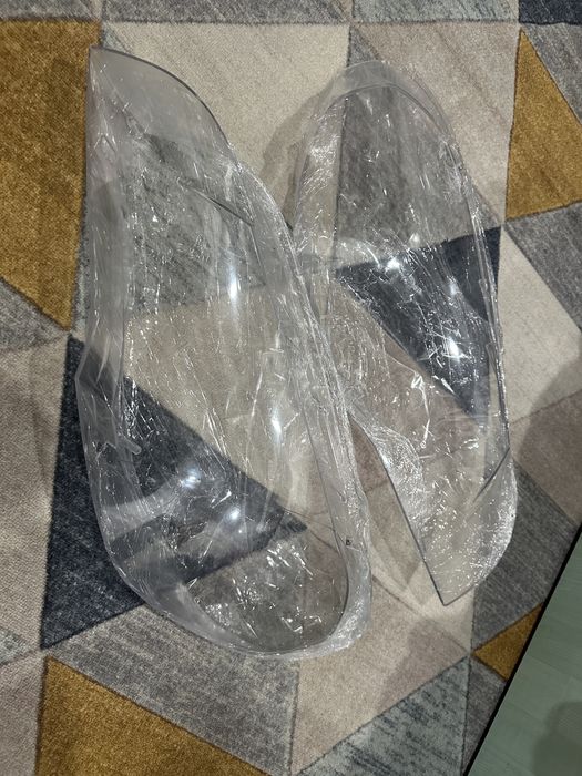 Стекла фар bmw e70