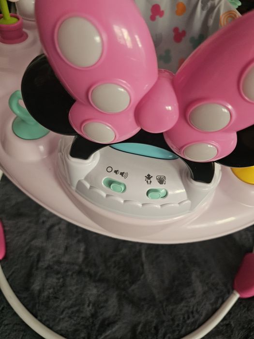 Premergator Disney Baby MINNIE MOUSE, Bright Starts, cu lumini si melodii, pentru copii de la 6 luni