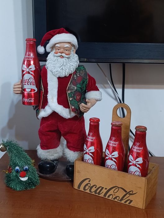 Ofertă Moș Crăciun cu sticlă de coca cola