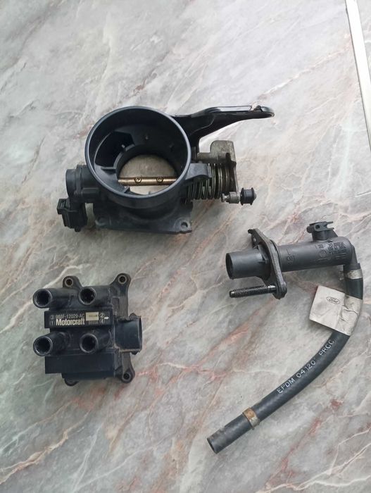 Авточасти за Мазда Трибют