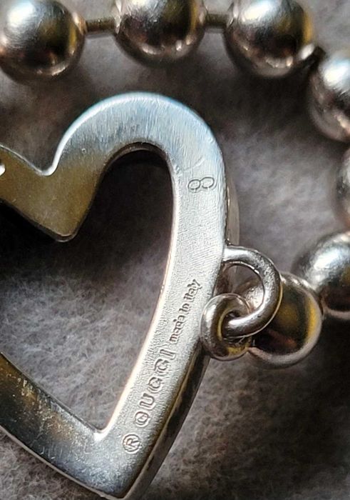 Inel Gucci din argint, cu margele si inima, fabricat in Italia