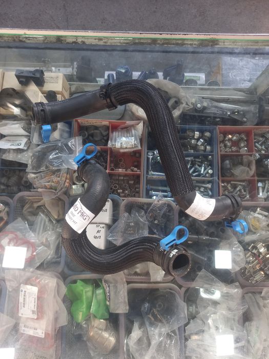 Потрубка радиатор Treker Onix Monza Malibu Kaptiva Tahoe Traverse