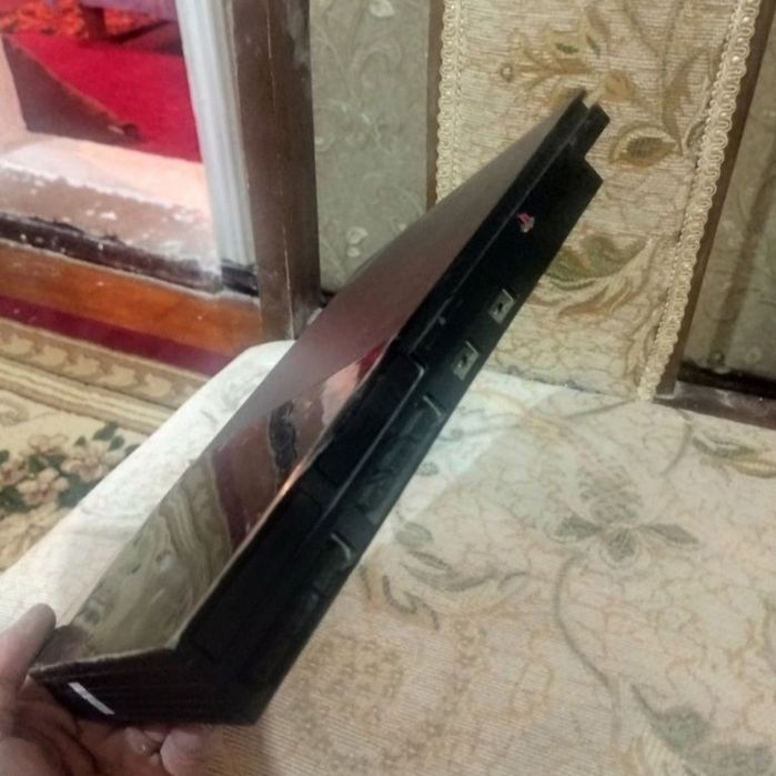 Sony Playstation 2 slim ideal.