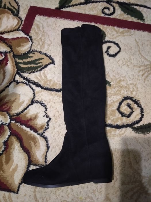 Продам новые сапоги