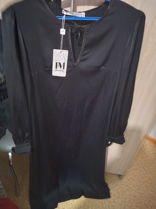 Зимний пуховик новый